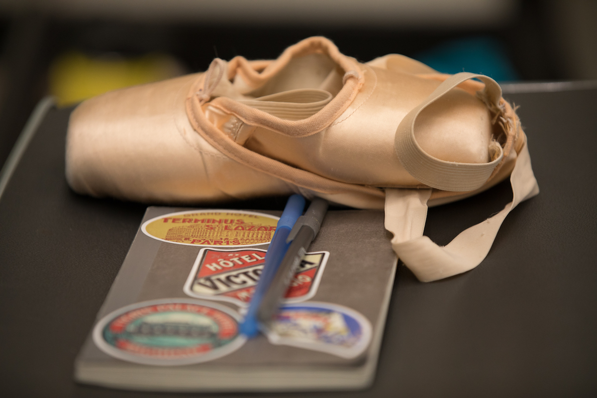 Pointe shoes and notebook