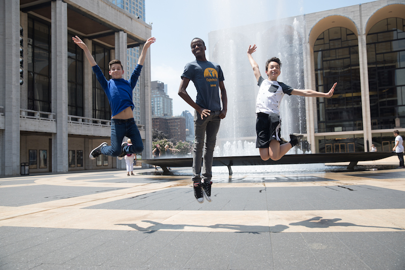Boys jumping at Lincoln Center 