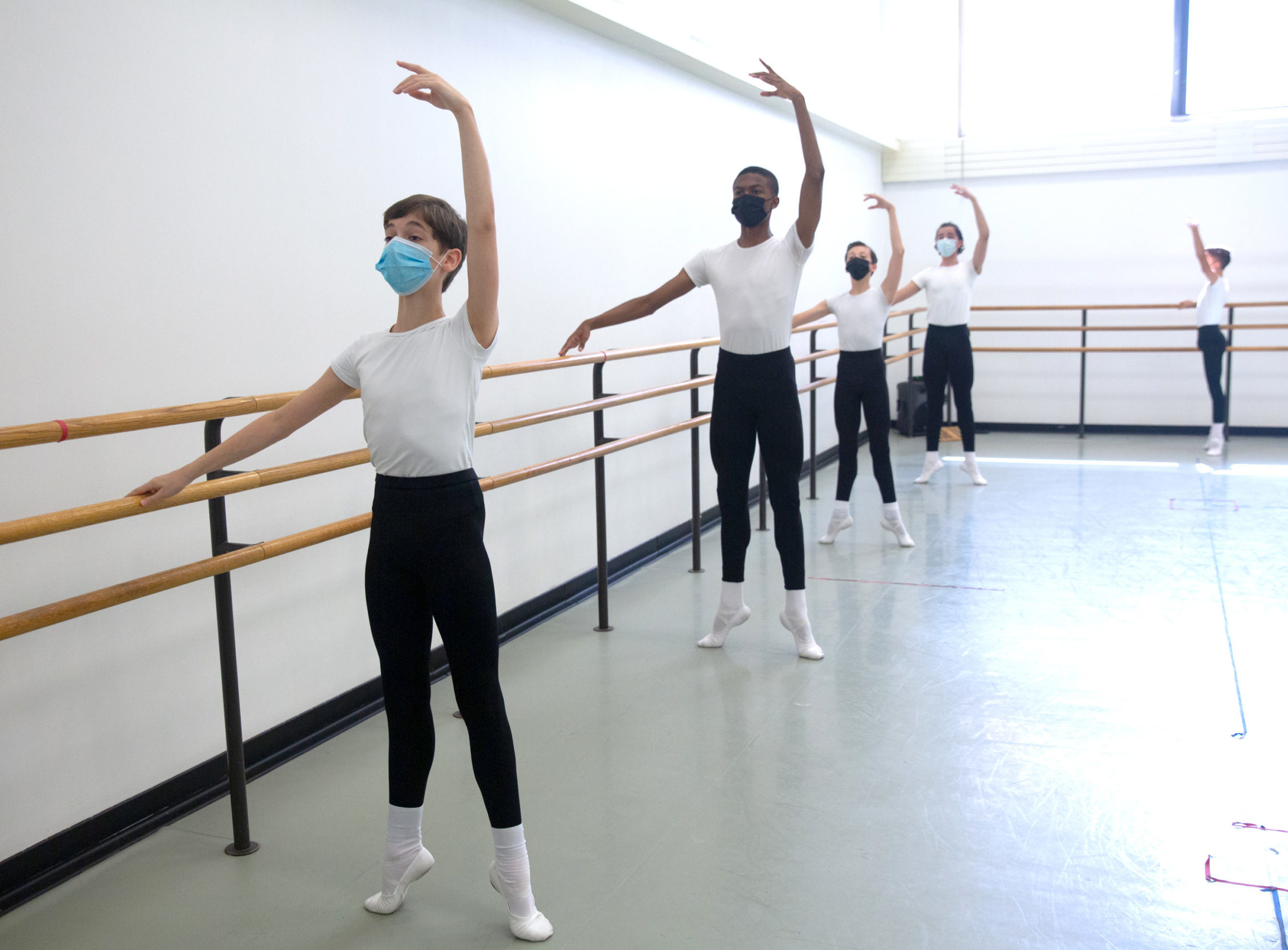 boys in releve first position at the barre - 2021 Summer Course